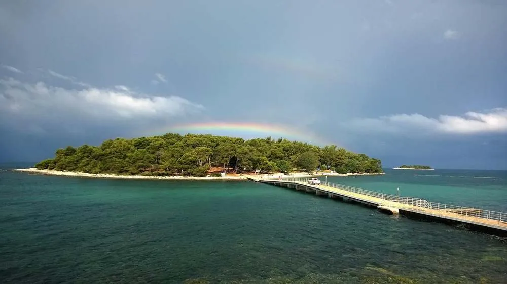 Koversada — an island with a rainbow